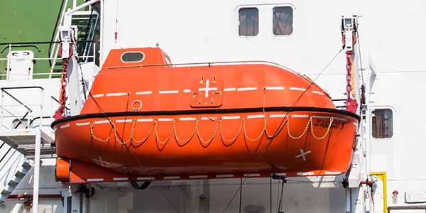 Totally enclosed lifeboat on a cargo ship
