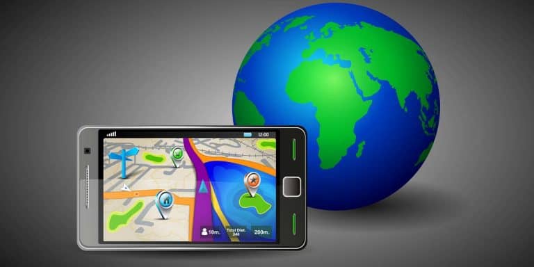 Globe and mobile phone with a maps app open