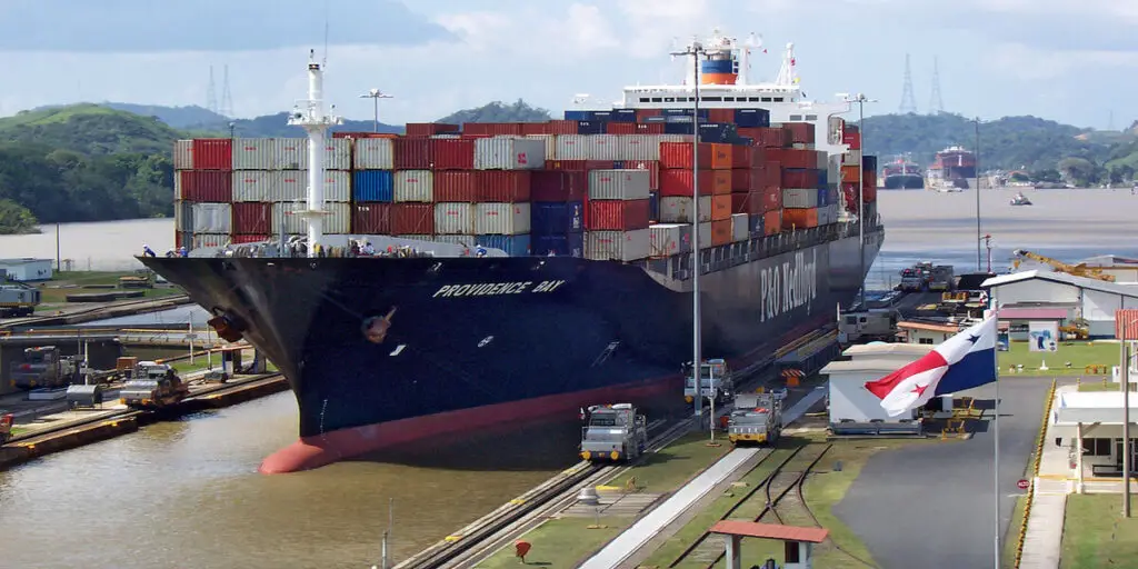 A photo of the 292-metre container ship Providence Bay going through one of the old Panama Canal locks